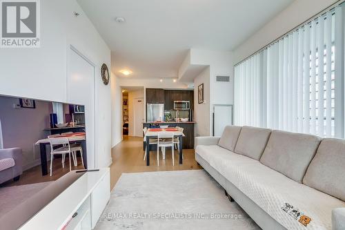 2304 - 20 Shore Breeze Drive, Toronto, ON - Indoor Photo Showing Living Room