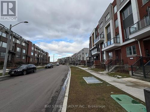 125 Frederick Tisdale Drive, Toronto, ON - Outdoor With Balcony With Facade