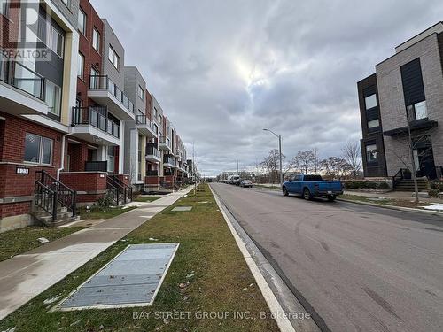 125 Frederick Tisdale Drive, Toronto, ON - Outdoor With Balcony With Facade