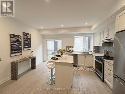 125 Frederick Tisdale Drive, Toronto, ON - Indoor Photo Showing Kitchen With Double Sink