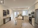 125 Frederick Tisdale Drive, Toronto, ON  - Indoor Photo Showing Kitchen With Double Sink 