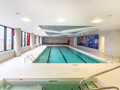 Piscine - 313-4239 Rue Jean-Talon O., Montréal (Côte-Des-Neiges/Notre-Dame-De-Grâce), QC - Indoor Photo Showing Other Room With In Ground Pool