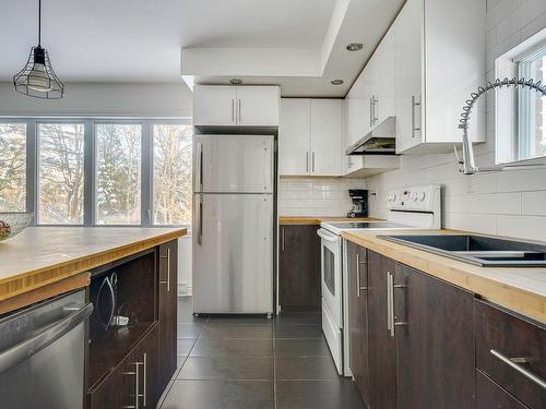 Cuisine - 11 Rue Boivin, Saint-Hippolyte, QC - Indoor Photo Showing Kitchen With Double Sink