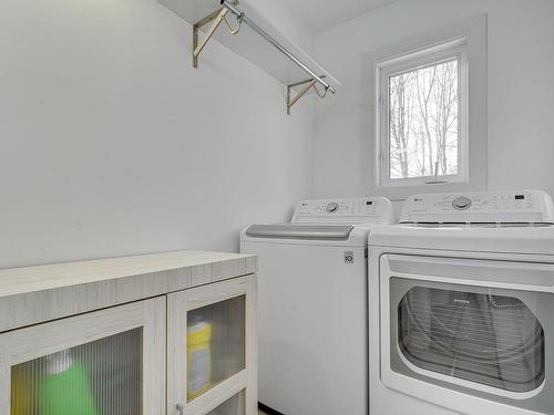 Salle de lavage - 11 Rue Boivin, Saint-Hippolyte, QC - Indoor Photo Showing Laundry Room