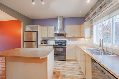 2208 Westside Park Avenue, Invermere, BC - Indoor Photo Showing Kitchen With Double Sink