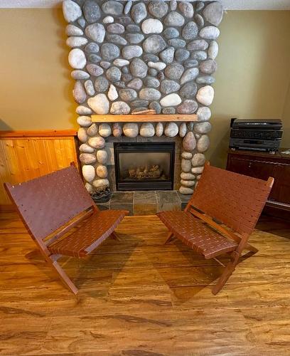 148 Stemwinder Drive, Kimberley, BC - Indoor Photo Showing Living Room With Fireplace