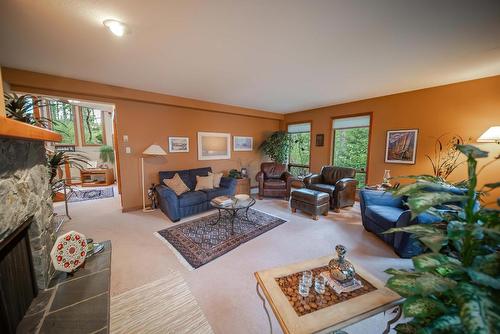 3023 Westside Road, Moyie, BC - Indoor Photo Showing Living Room With Fireplace