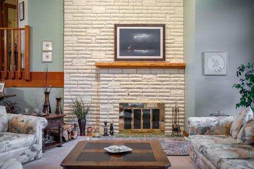 3023 Westside Road, Moyie, BC - Indoor Photo Showing Living Room With Fireplace