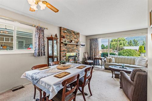 1405 Alder Street, Creston, BC - Indoor Photo Showing Dining Room With Fireplace