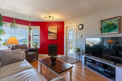 405-1120 Hugh Allan Drive, Kamloops, BC - Indoor Photo Showing Living Room With Fireplace