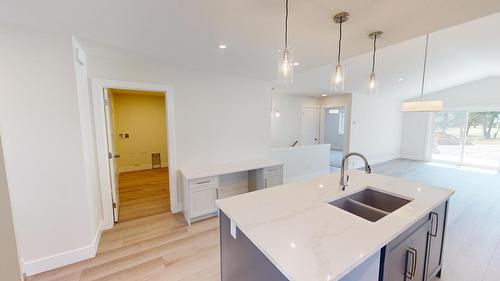 B-351 Legacy Lookout, Cranbrook, BC - Indoor Photo Showing Kitchen With Double Sink