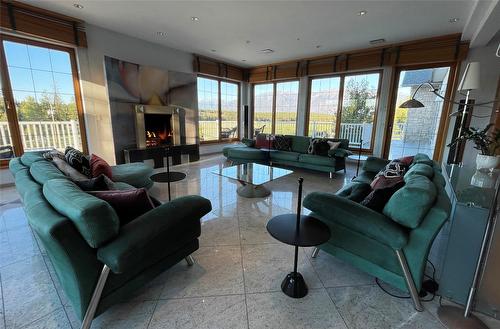 8285 Olson Road, Ta Ta Creek, BC - Indoor Photo Showing Living Room With Fireplace