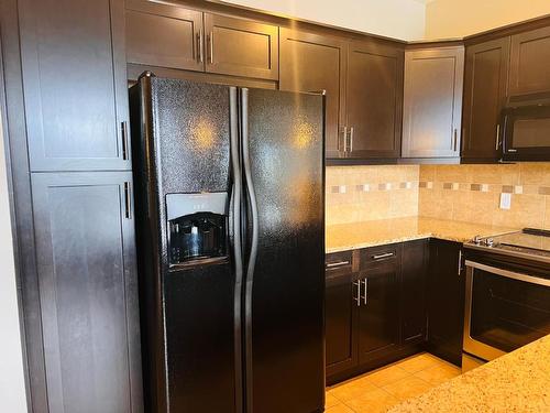 822C-800 Bighorn Boulevard, Radium Hot Springs, BC - Indoor Photo Showing Kitchen