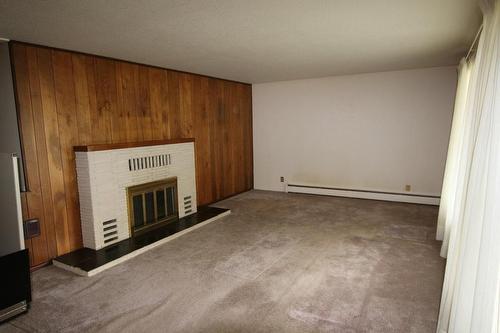 217 6Th Street, Nakusp, BC - Indoor Photo Showing Other Room With Fireplace