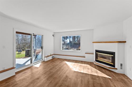 412 Sumac Road, Tappen, BC - Indoor Photo Showing Living Room With Fireplace