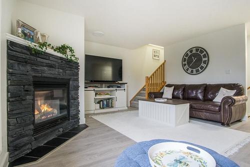 6-4878 Ridge Road, Radium Hot Springs, BC - Indoor Photo Showing Living Room With Fireplace