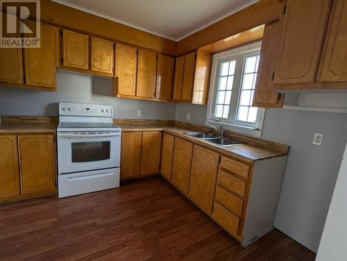 32 Main Street, Frederickton, NL - Indoor Photo Showing Kitchen With Double Sink