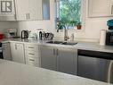 7 Upper - 8196 Mcleod Road, Niagara Falls (222 - Brown), ON  - Indoor Photo Showing Kitchen With Double Sink 