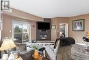 4500 Ypres Unit# 311, Windsor, ON  - Indoor With Fireplace 