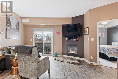 4500 Ypres Unit# 311, Windsor, ON - Indoor Photo Showing Living Room With Fireplace