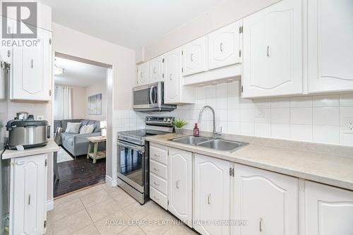 54 - 105 Hansen Road N, Brampton, ON - Indoor Photo Showing Kitchen With Double Sink