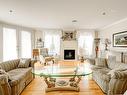 Salon - 407-3100 Boul. Notre-Dame, Laval (Chomedey), QC  - Indoor Photo Showing Living Room With Fireplace 