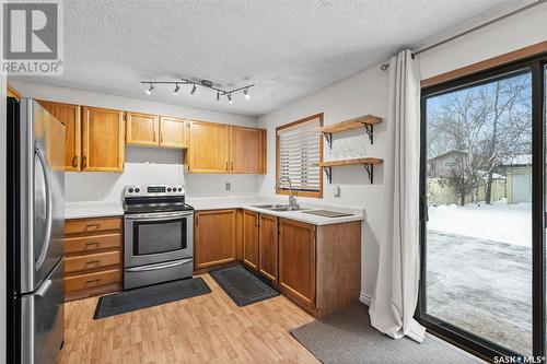 146 Weyakwin Drive, Saskatoon, SK - Indoor Photo Showing Kitchen With Double Sink