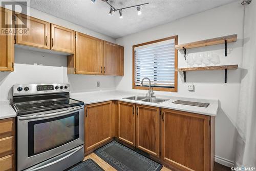 146 Weyakwin Drive, Saskatoon, SK - Indoor Photo Showing Kitchen With Double Sink