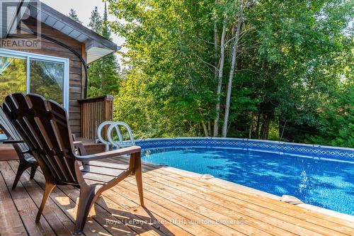 2825 Ib & O Rail Trail, Highlands East, ON - Outdoor With Above Ground Pool With Deck Patio Veranda