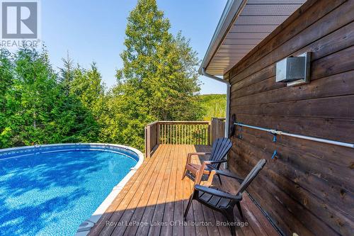 2825 Ib & O Rail Trail, Highlands East, ON - Outdoor With Above Ground Pool With Deck Patio Veranda With Exterior