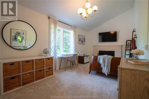 9525 River Line, Chatham, ON - Indoor Photo Showing Bedroom With Fireplace