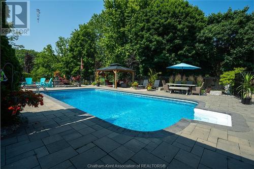 9525 River Line, Chatham, ON - Outdoor With In Ground Pool With Backyard