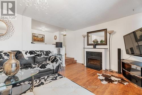 514 - 1599 Lassiter Terrace, Ottawa, ON - Indoor Photo Showing Other Room With Fireplace