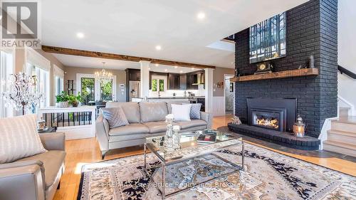 151 Grandore Street W, Georgian Bluffs, ON - Indoor Photo Showing Living Room With Fireplace