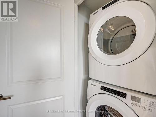 1722 - 8 Nahani Way, Mississauga, ON - Indoor Photo Showing Laundry Room