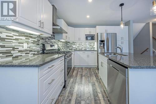 79 - 1061 Eagletrace Drive, London, ON - Indoor Photo Showing Kitchen With Stainless Steel Kitchen With Double Sink With Upgraded Kitchen