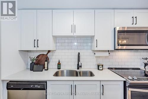 205 - 108 Summit Ridge Drive, Guelph (Grange Hill East), ON - Indoor Photo Showing Kitchen With Double Sink