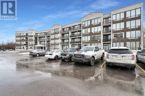 107 - 105 Bagot Street, Guelph (Onward Willow), ON - Outdoor With Facade