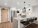 201-2520 Hackett Cres, Central Saanich, BC  - Indoor Photo Showing Kitchen With Stainless Steel Kitchen With Double Sink With Upgraded Kitchen 