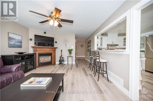 259 3 Mile, Lanark Highlands, ON - Indoor Photo Showing Living Room With Fireplace