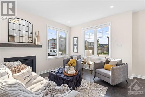 500 Escapade, Ottawa, ON - Indoor Photo Showing Living Room With Fireplace