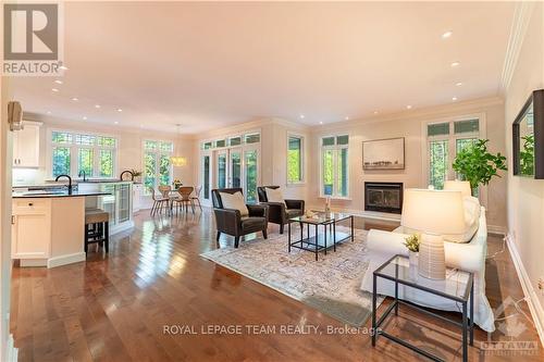 5422 Wadell Court, Ottawa, ON - Indoor Photo Showing Living Room With Fireplace