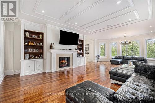 1413 Blackhorse Court, Ottawa, ON - Indoor Photo Showing Living Room With Fireplace