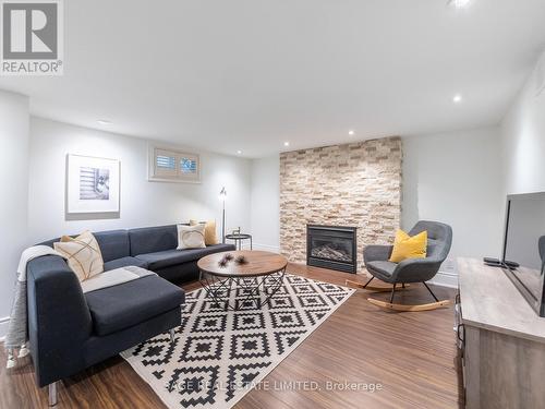 43 Lankin Boulevard, Toronto, ON - Indoor Photo Showing Living Room With Fireplace