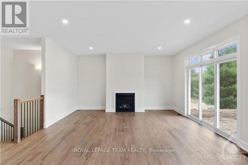 1166 Jamieson Lane, Horton, ON - Indoor With Fireplace