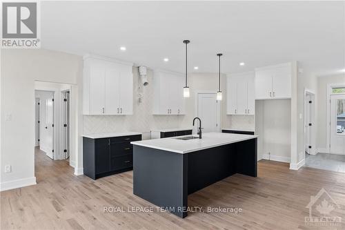 1166 Jamieson Lane, Horton, ON - Indoor Photo Showing Kitchen With Upgraded Kitchen