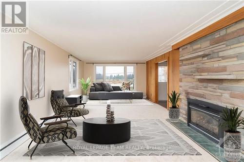 1080 Perth Road, Beckwith, ON - Indoor Photo Showing Living Room With Fireplace