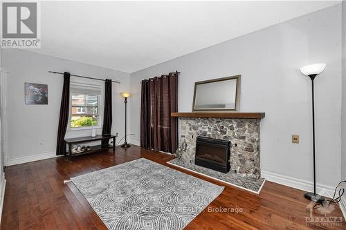 1134 O'Grady Street, Ottawa, ON - Indoor Photo Showing Living Room With Fireplace