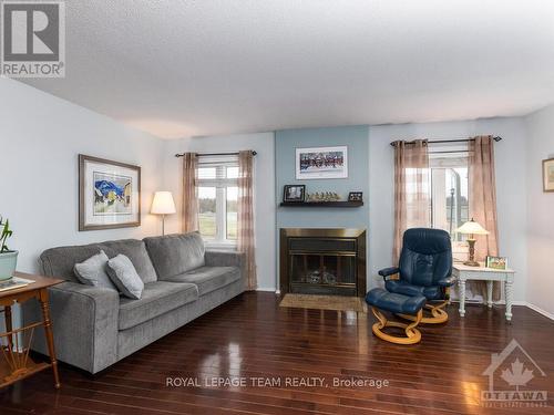 1-7 Timberview Way, Ottawa, ON - Indoor Photo Showing Living Room With Fireplace