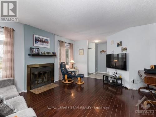 1-7 Timberview Way, Ottawa, ON - Indoor Photo Showing Living Room With Fireplace